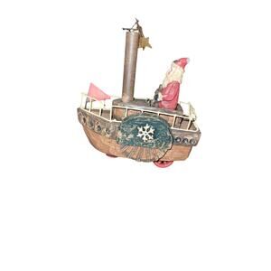 Vintage Captain Santa Claus Springing His Steam Boat Along
